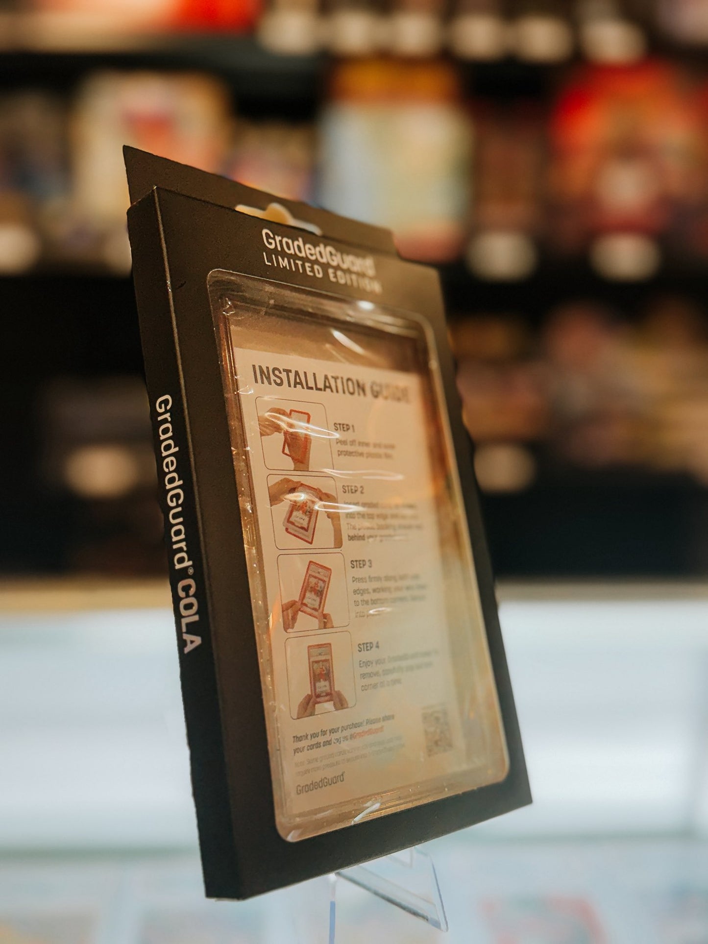 GradedGuard Cola packaging with installation instructions